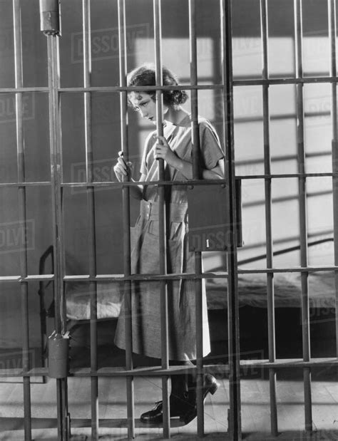 Woman In Jail Cell Stock Photo Dissolve